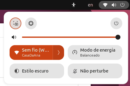 Menu do sistema com o bloco Sem fio (Wi-Fi) mostrando CasaDaAna embaixo, e o ícone de Wi-Fi na barra superior